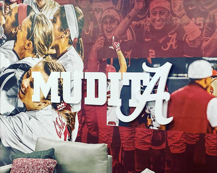 Mudita on the walls of the Alabama Softball facility